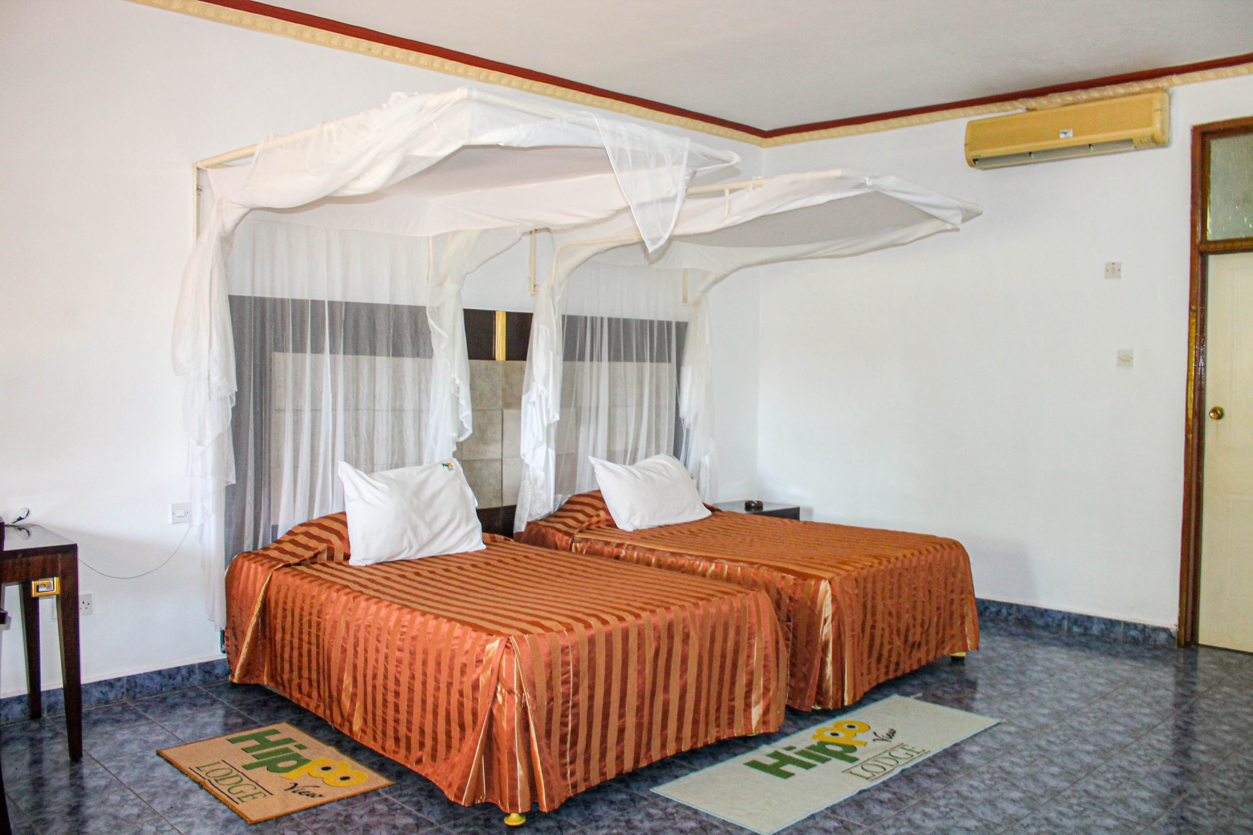 inside view of room with 2 single beds