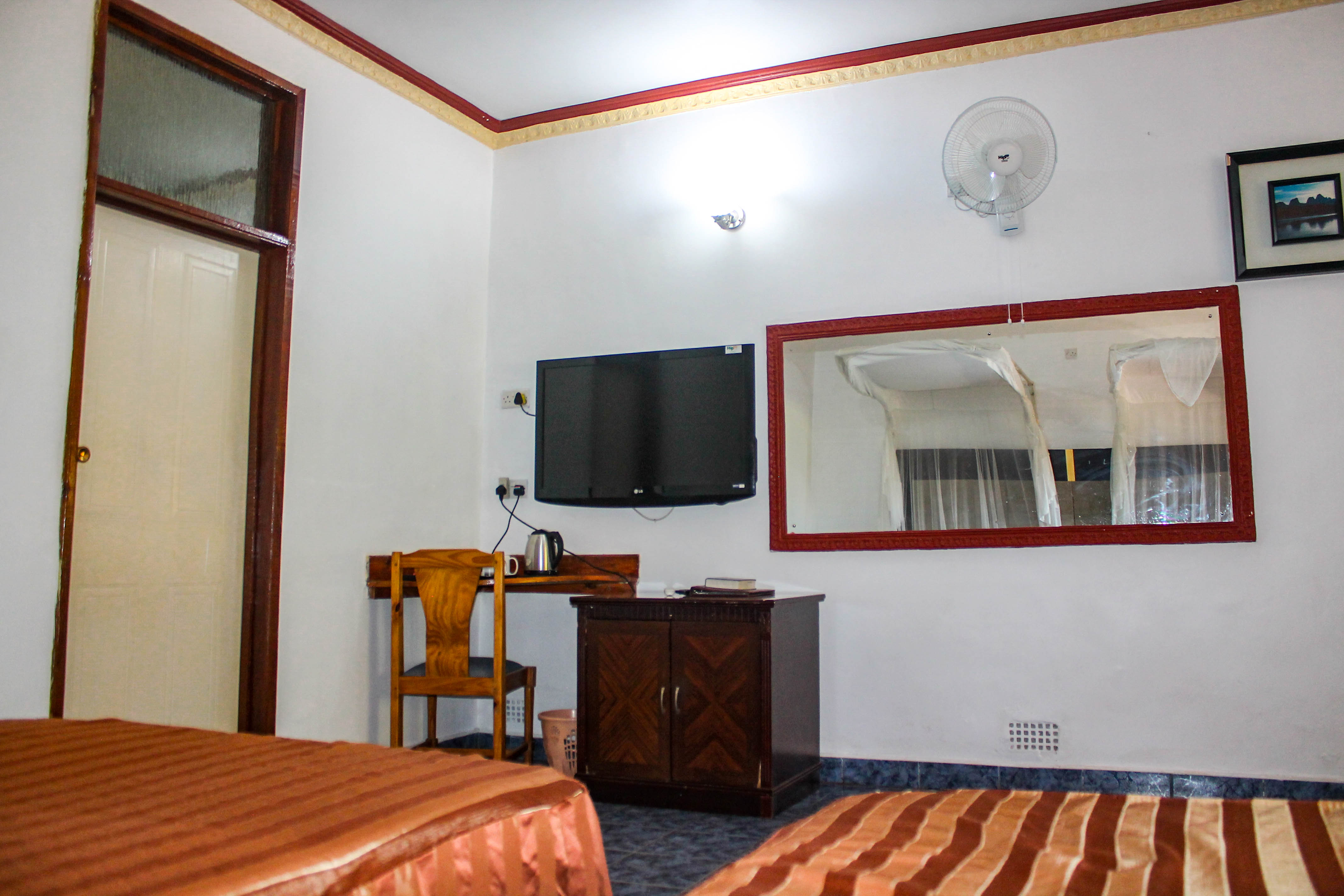 outside-view-of-2-rooms-with-chairs-outside
